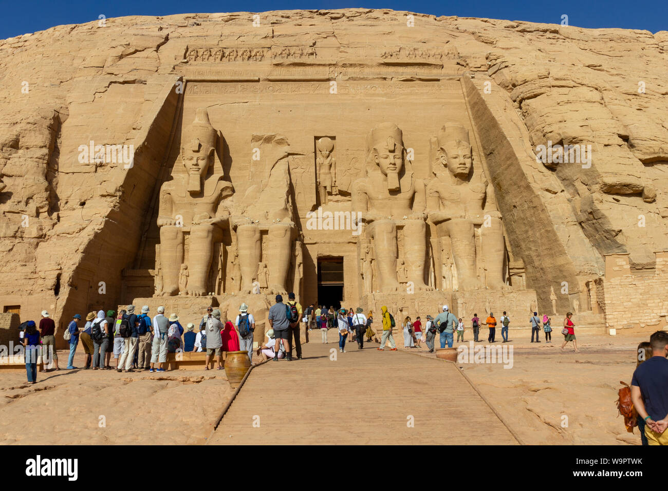 ABU SIMBEL, EGYPT - OKT 23, 2018: Great temple of Ramses II. Big statues carved out of rock Stock Photo