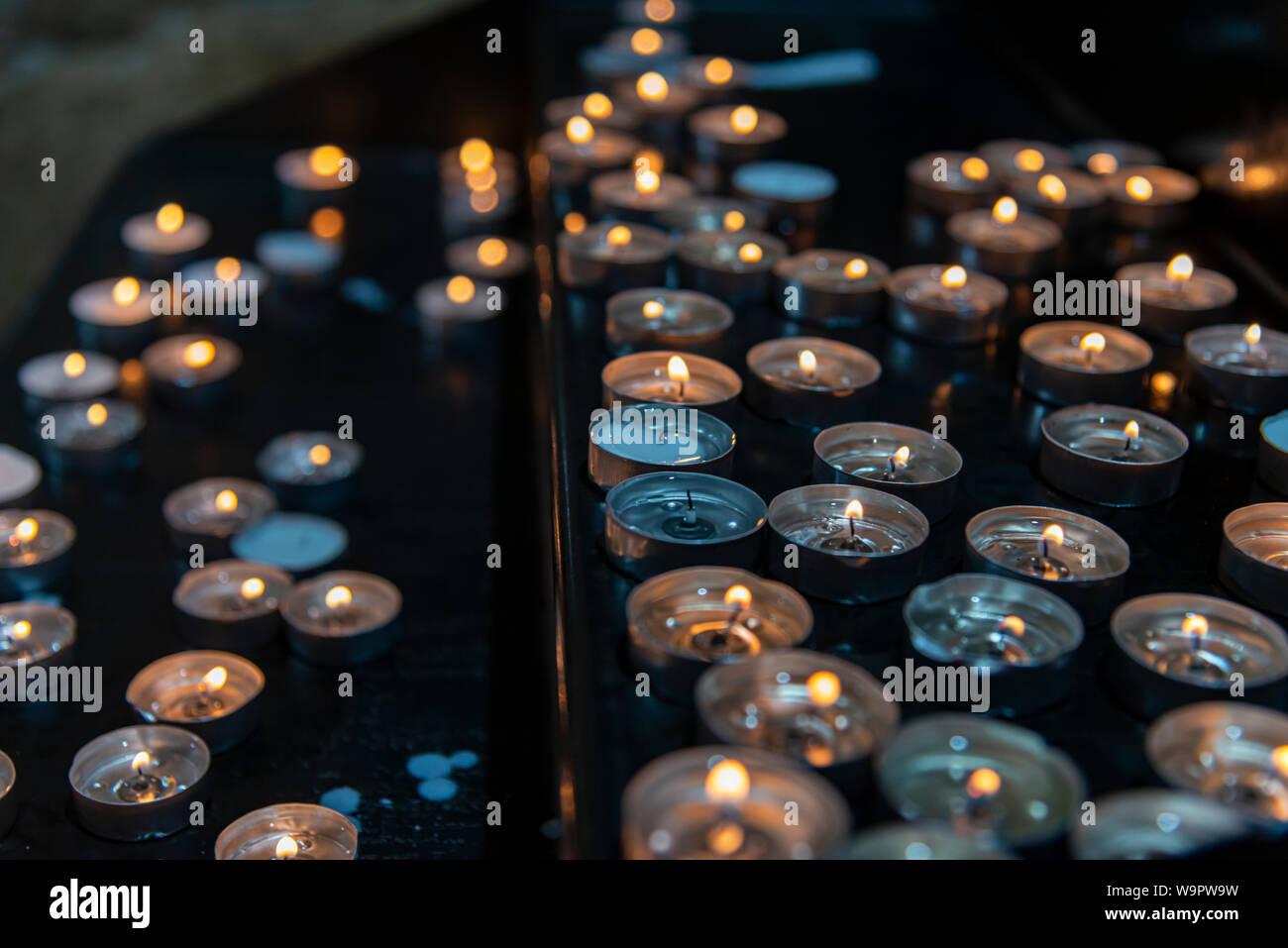 Prayer candles in a church Stock Photo Alamy