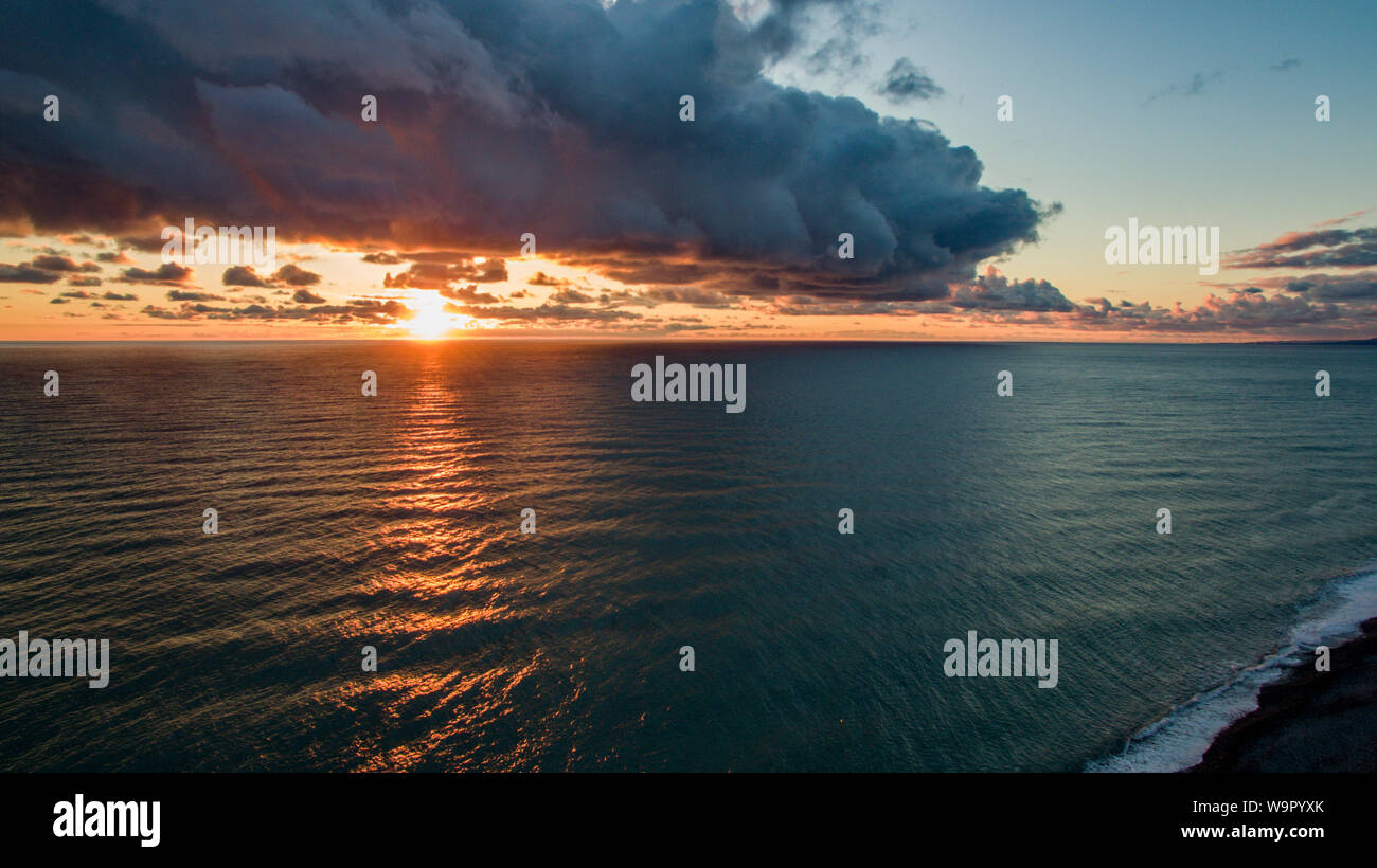 Aerial view of the sea landscape with a beautiful sunset. Dramatic sky ...