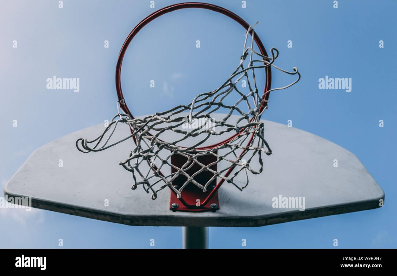 Low angle closeup shot of a basket hoop on a backboard Stock Photo