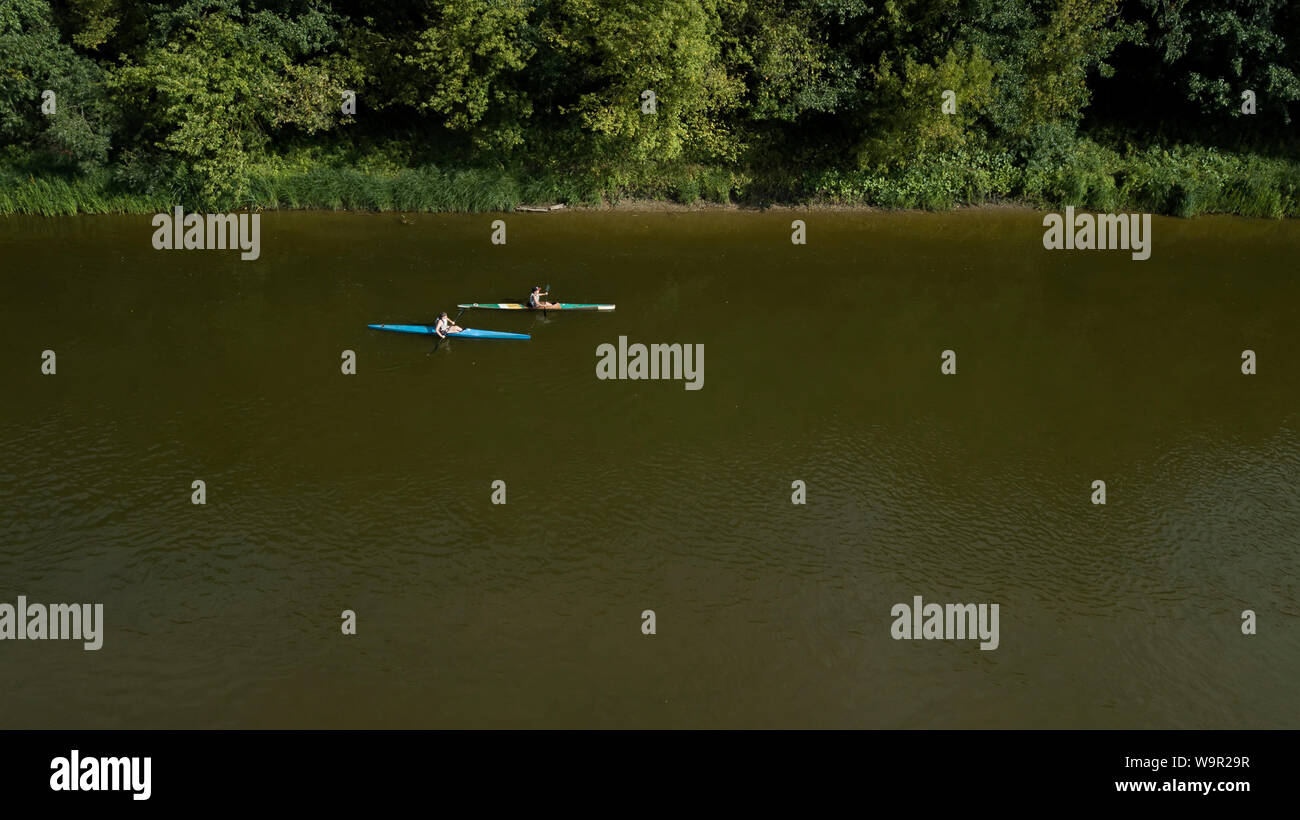 Aerial view team rowing on water hi-res stock photography and images ...