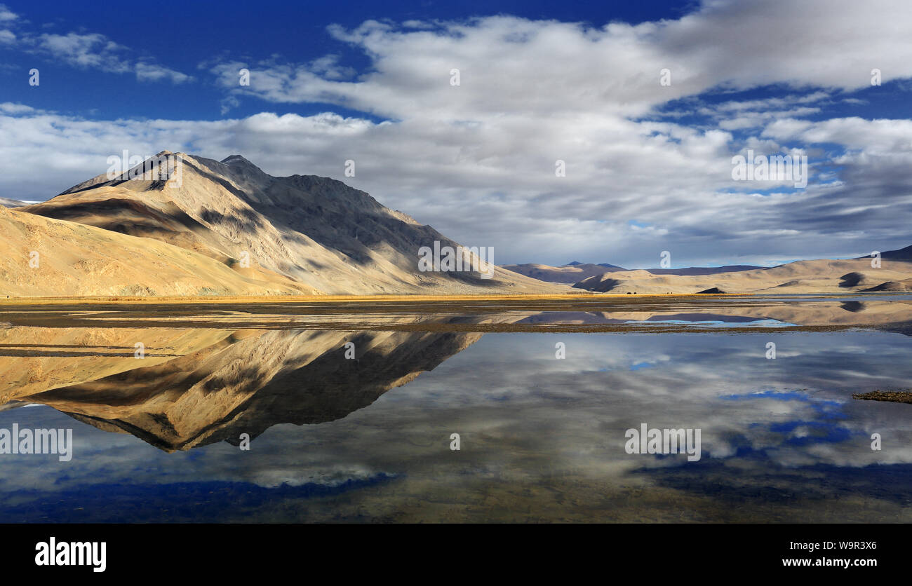 Tso Moriri lake, dramatic sky with reflection in the water, Changtang, Ladakh, India Stock Photo