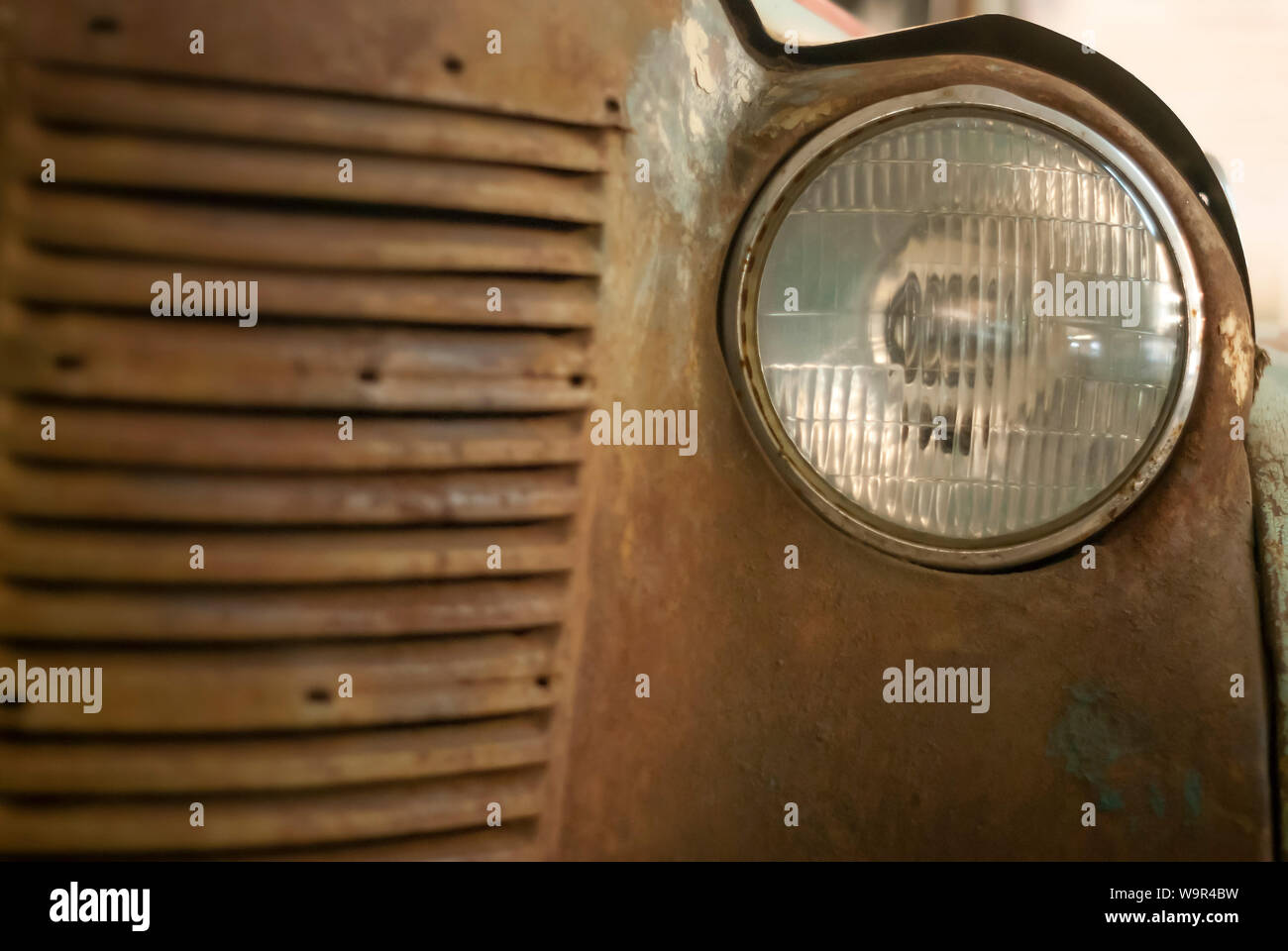 Rusty Car Radiator fragment of the front of a rusted vintage car, part of the radiator and ...
