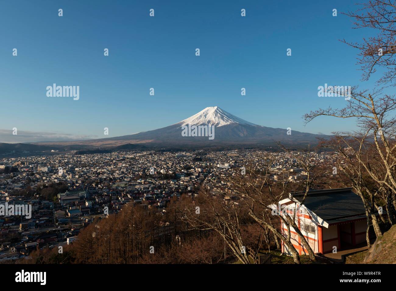 View over Fujiyoshida City and Mount Fuji Volcano, Yamanashi Prefecture, Japan Stock Photo