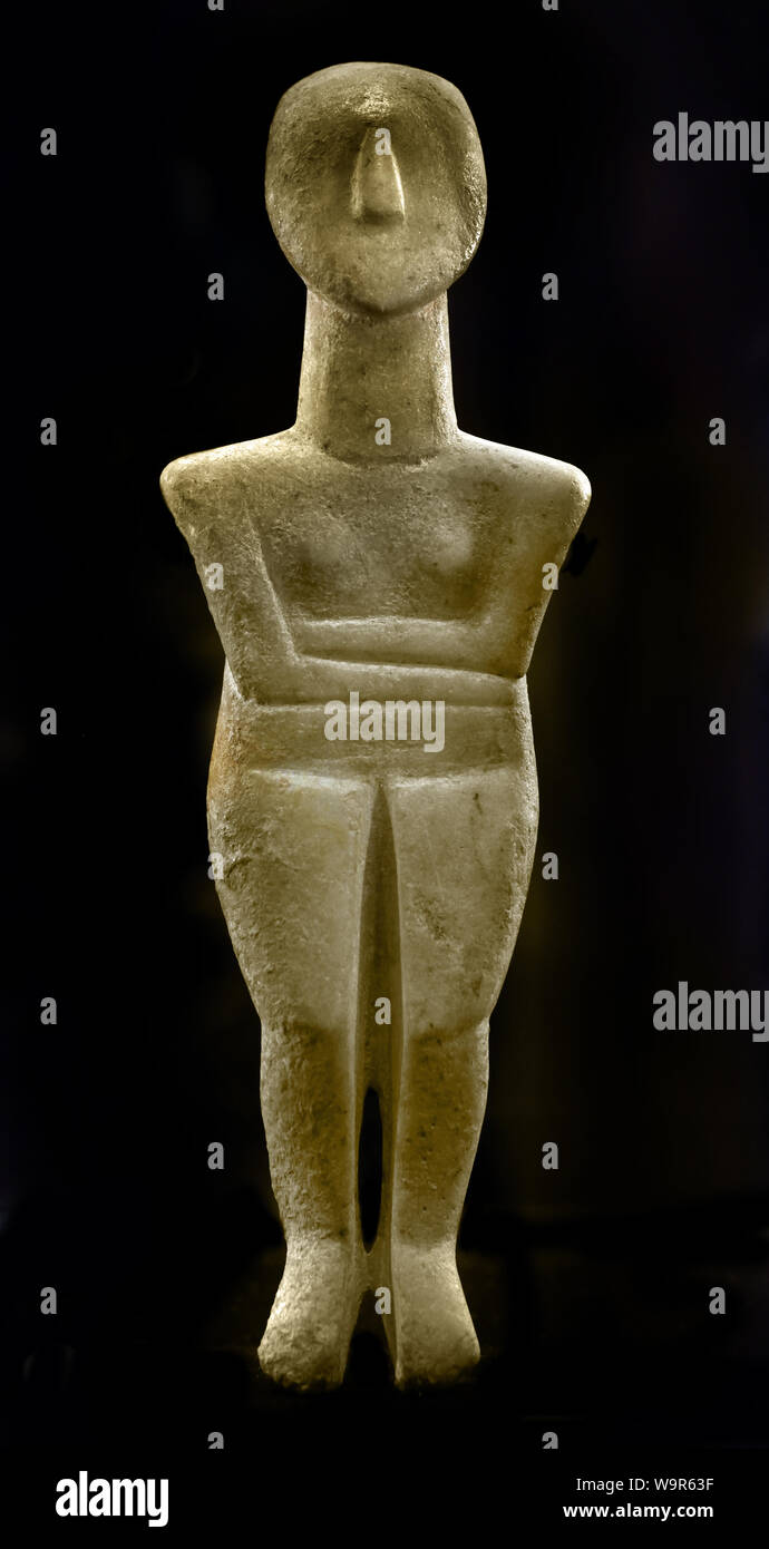 Female figurines Group of Syros  Ancient Cycladic II (2700 - 2300 BC) Type of Chalandriani Marble H 19.20 cm. Preclassical Greece Greek Stock Photo