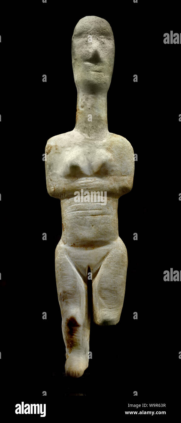 Female figurines Group of Syros  Ancient Cycladic II (2700 - 2300 BC) Type of Chalandriani Marble H 19.20 cm. Preclassical Greece Greek Stock Photo