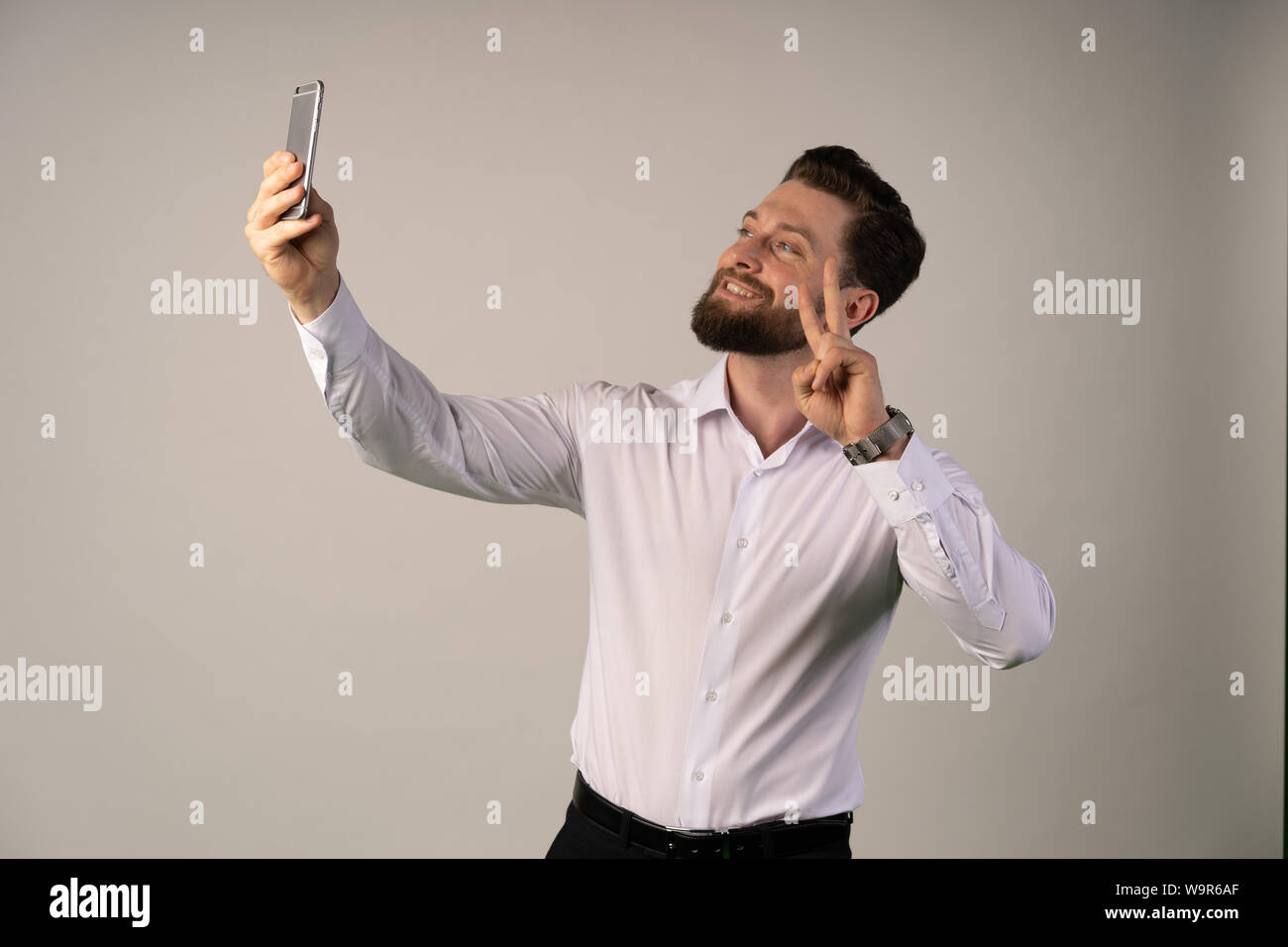 Caucasian man do some streaming. Social networks. Fans. Likes. Happiness. Stock Photo