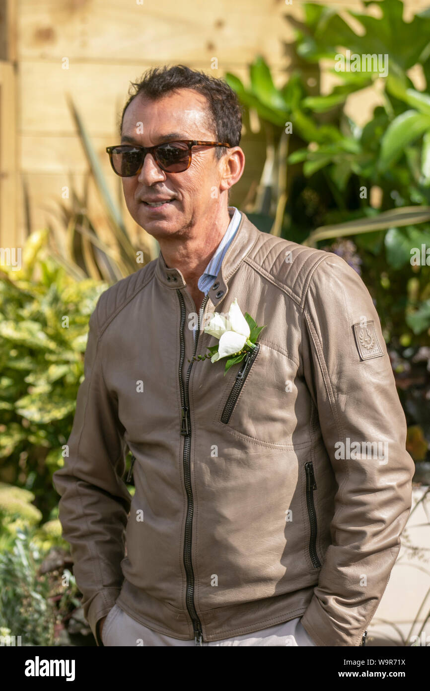 Strictly Come Dancing Bruno Tonioli an Italian choreographer, ballroom and Latin dancer, and TV personality, whoi has appeared as a judge on the British television dance competition Strictly Come Dancing casts his critical eye over the show winning gardens as he opens the 2019 Southport Flower Show in Merseyside.  The TV favourite welcomed visitors to the seaside event as it celebrates its 90th anniversary. Stock Photo
