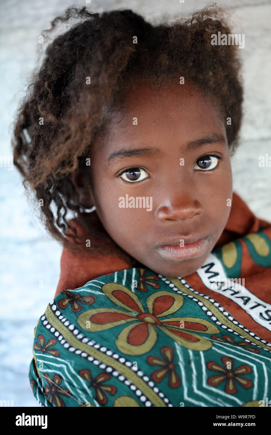Beautiful girl in Morondava, Madagascar. Due to an ongoing political crisis Madagascar is among the poorest countries in the world Stock Photo