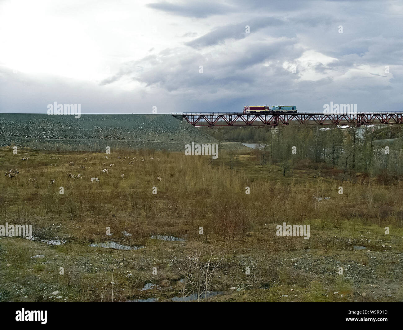 Railway bridge across the river. Steel construction Stock Photo