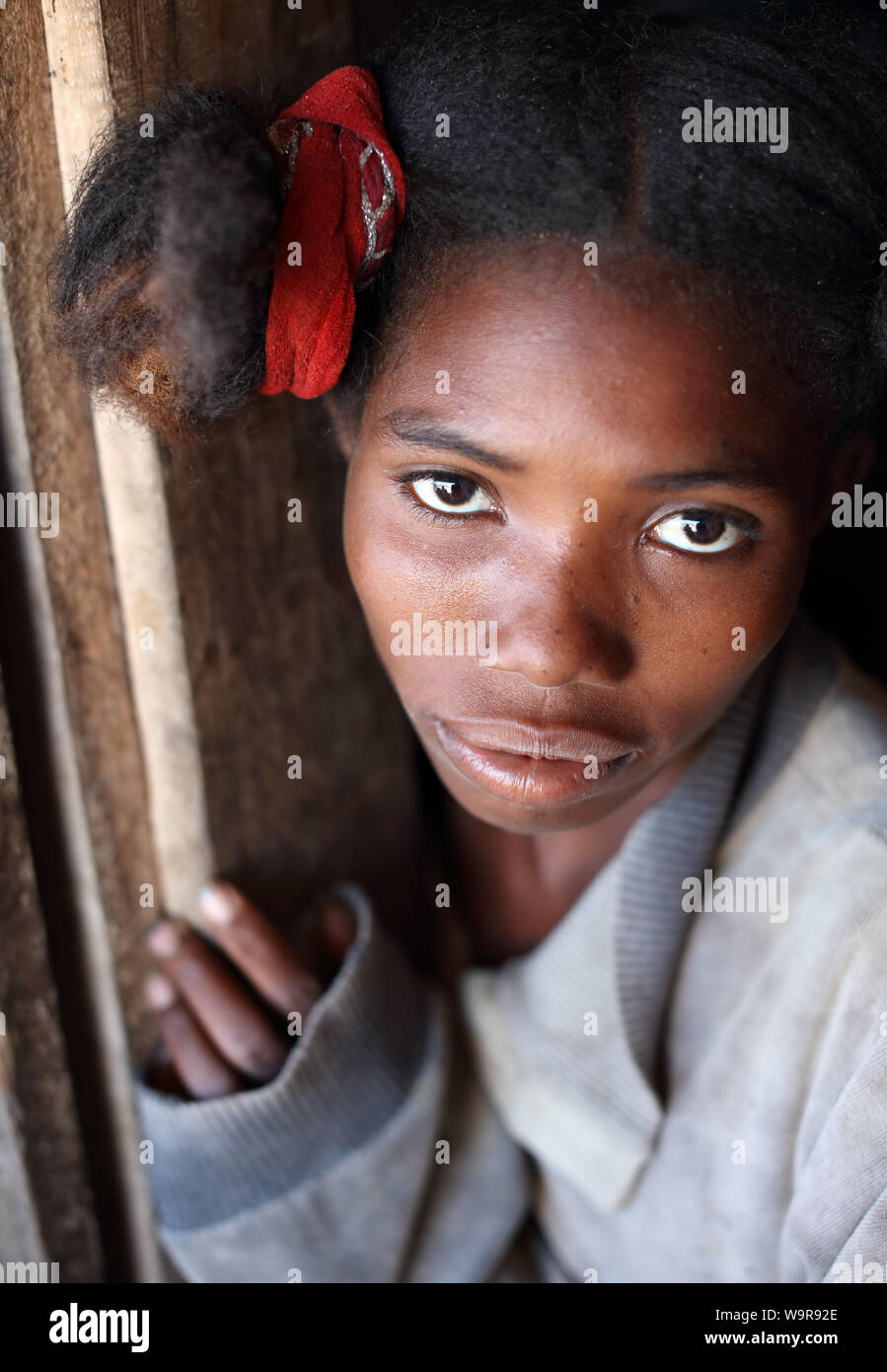 Beautiful girl in Morondava, Madagascar. Due to an ongoing political crisis Madagascar is among the poorest countries in the world Stock Photo