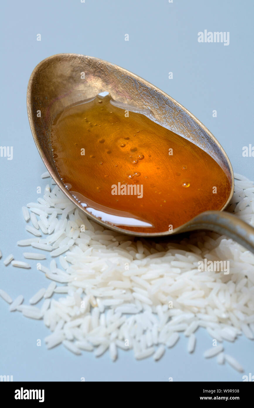 Reissirup, Reissirup in Loeffel, Reishonig Stock Photo