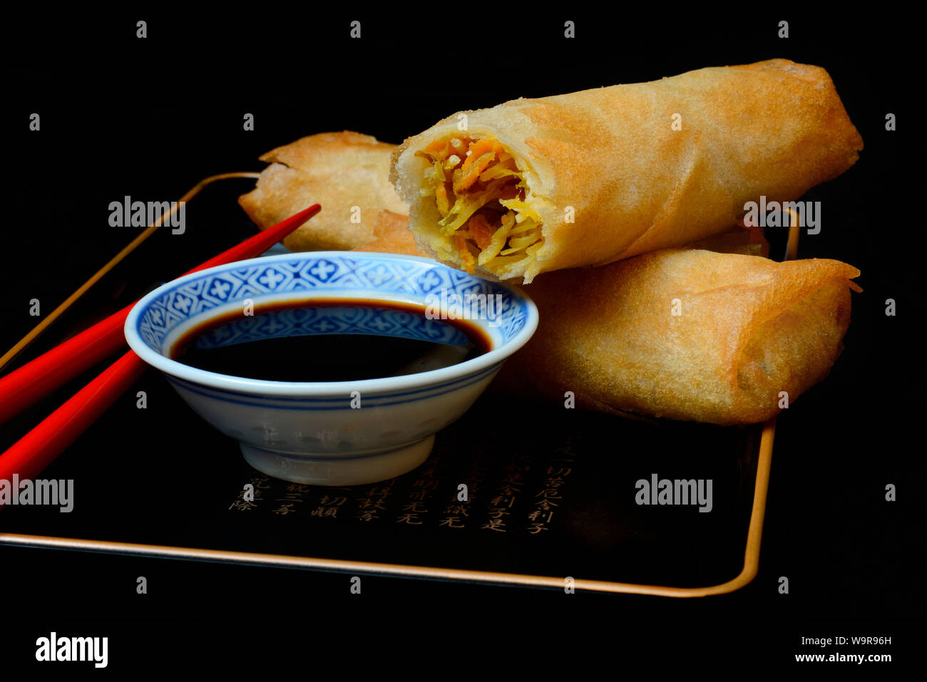 spring rolls and soy sauce Stock Photo