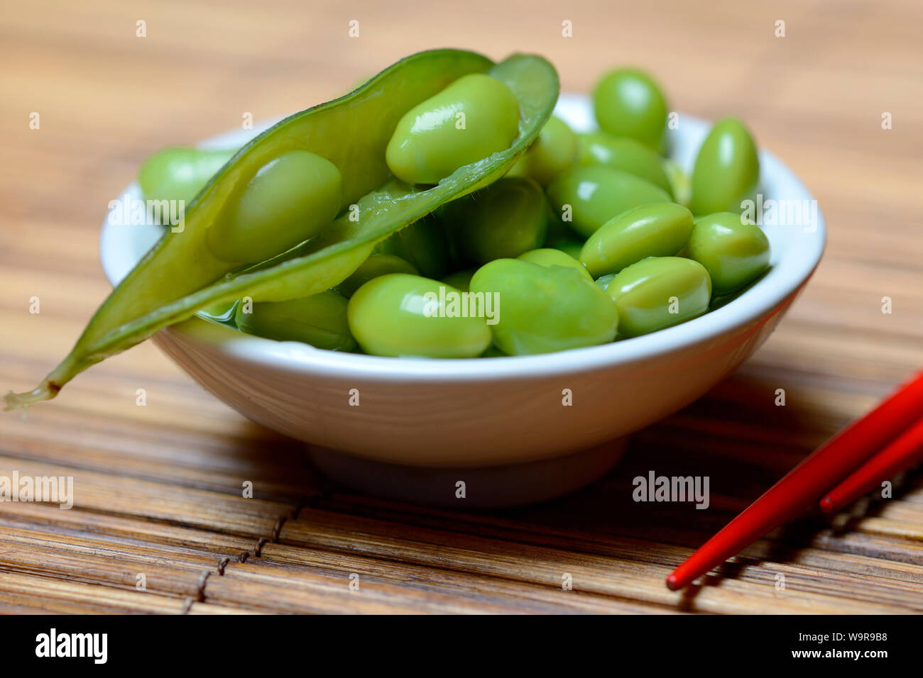 cooked unripe soybeans, Edamame, Glycine max Stock Photo