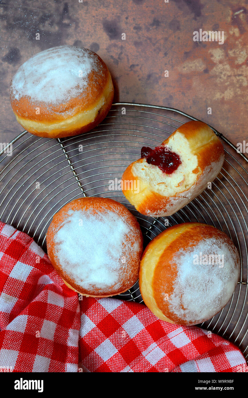 Berliner Pfannkuchen Angebissen Stock Photo Alamy