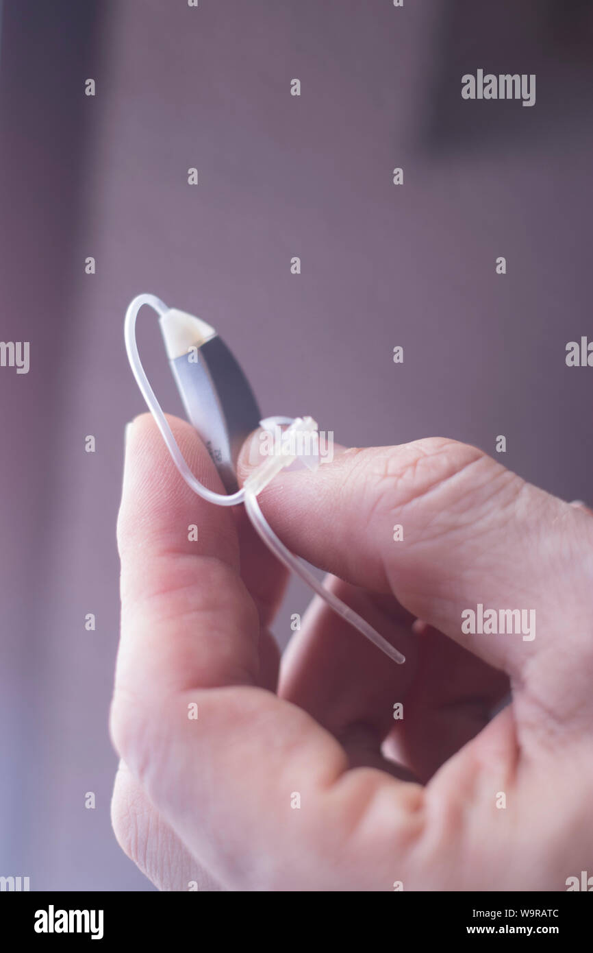 Digital modern technology for deaf people micro hearing aid Stock Photo