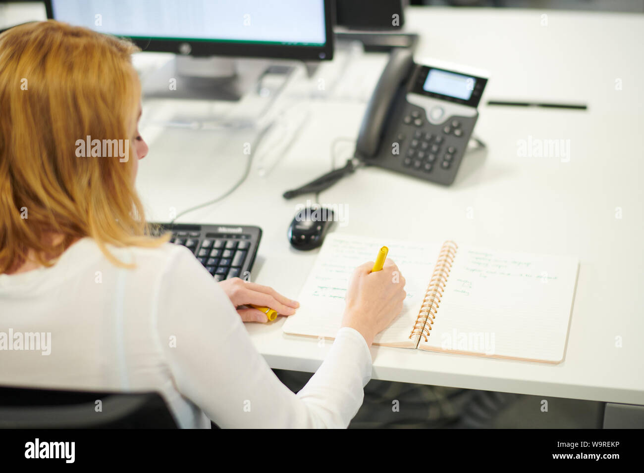 At the office working Stock Photo Alamy