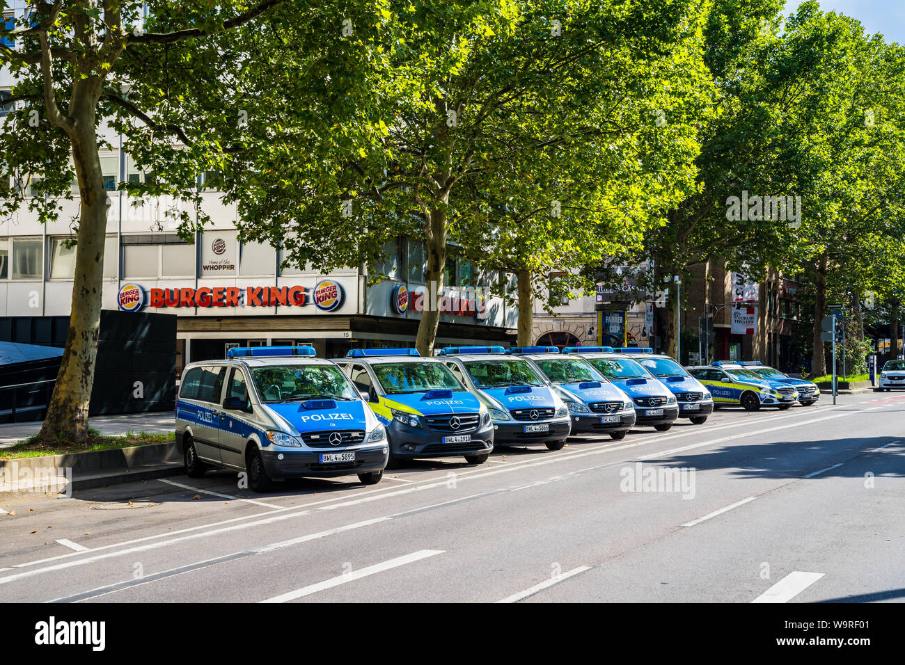 Stuttgart, Germany, August 14, 2019, Many blue police cars parking in downtown at theodor heuss street police station waiting to be called to help peo Stock Photo