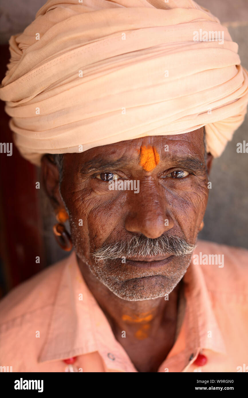 Sadhu (holy man) on the ghats of Ganges in Varanasi, India. Varanasi is the holiest of the seven sacred cities in India. Stock Photo