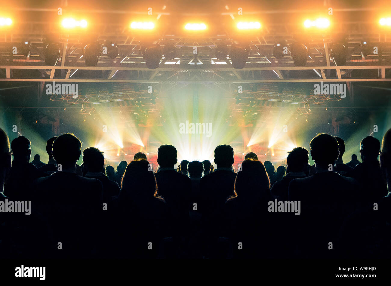 Concert spectators in front of a bright stage with live music Stock ...