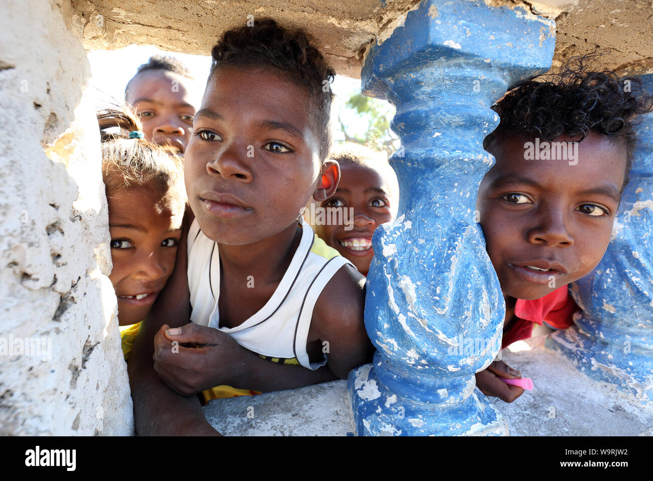 Children watch the celebration of the Independence Day in Anakao, Madagascar. Madagascar is among the poorest countries in the world Stock Photo