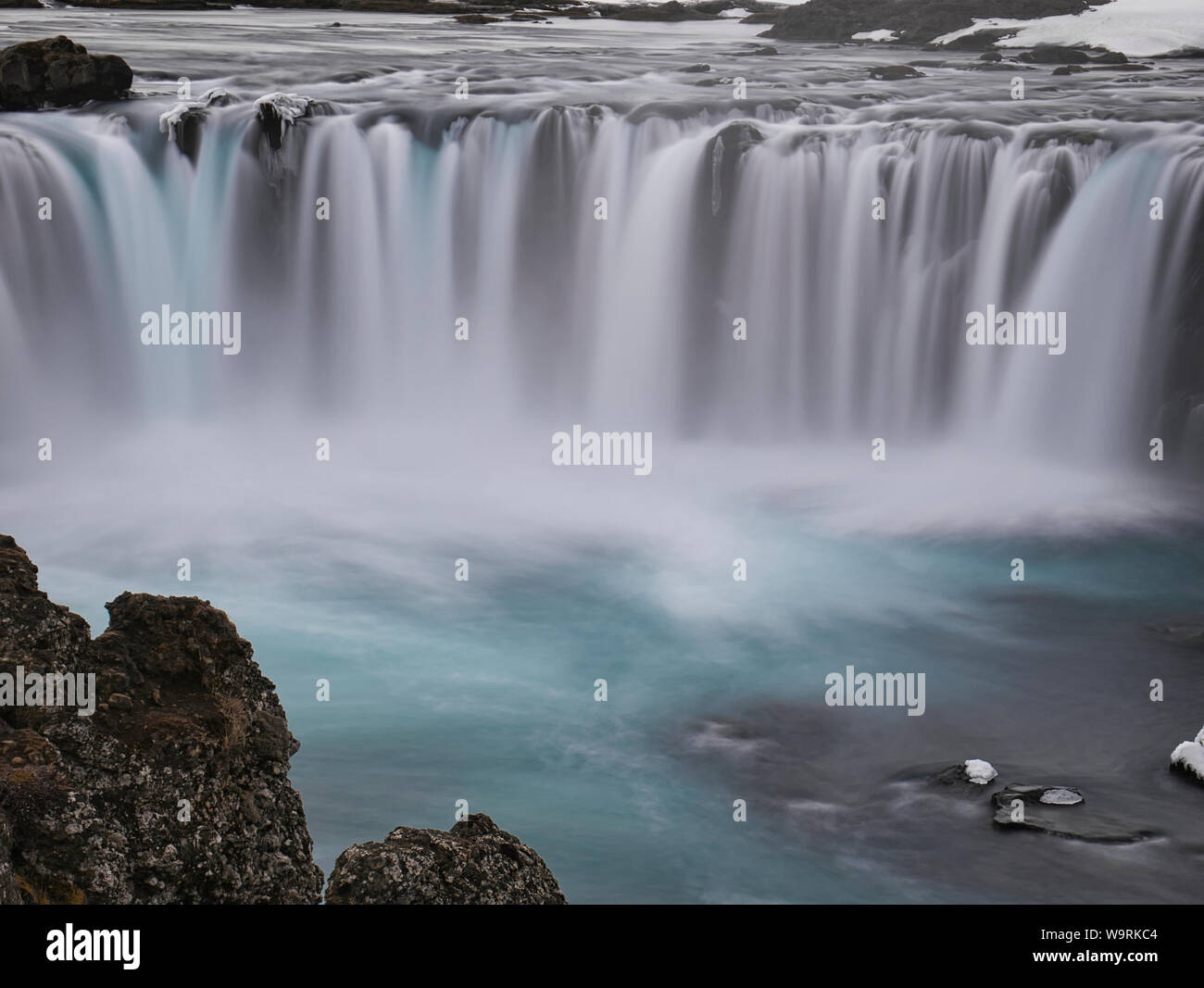 The blue water of the Godafoss waterfall in Iceland. Photo from March Stock Photo