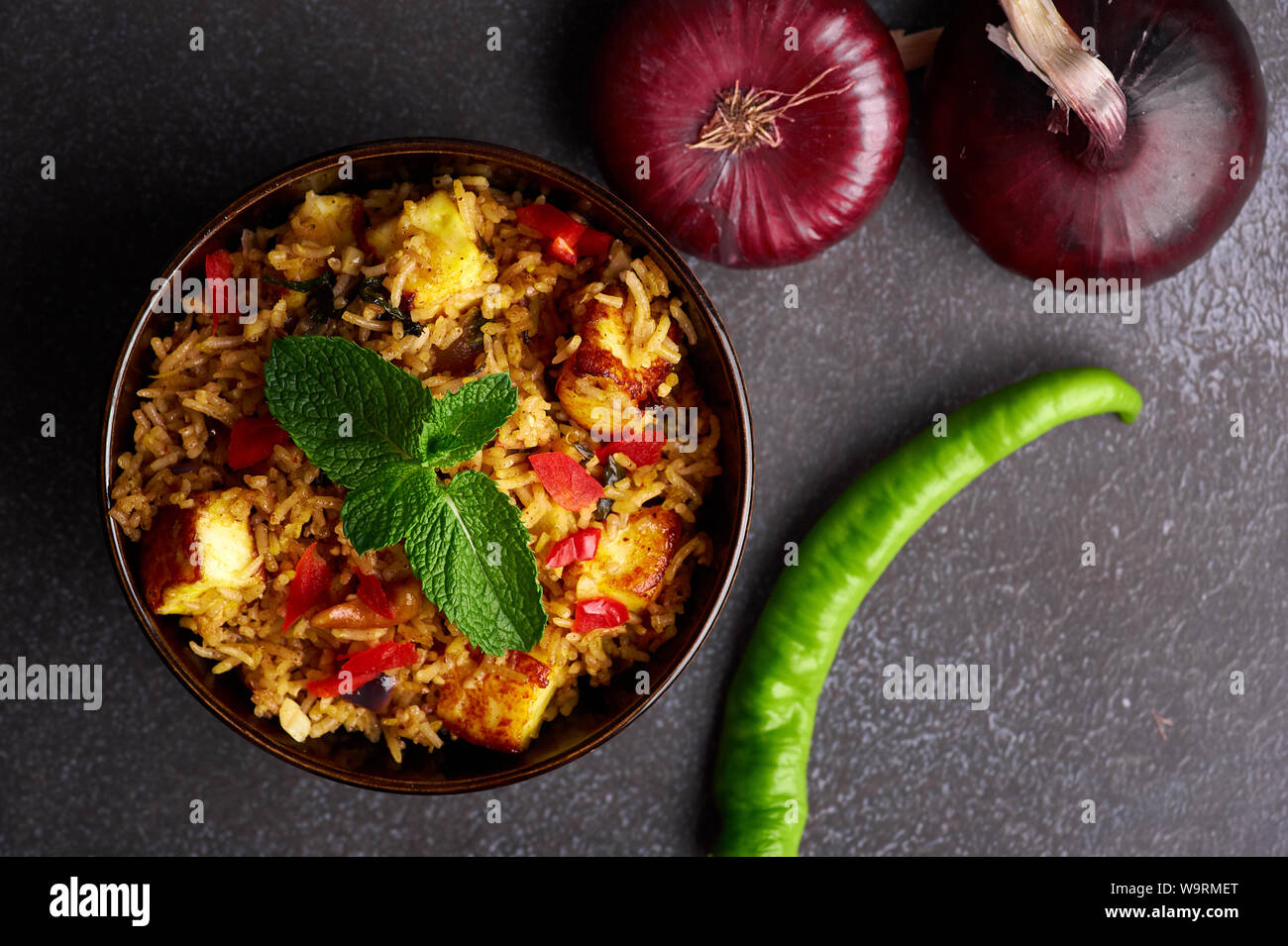 vegetarian paneer biryani at black background. paneer biryani is