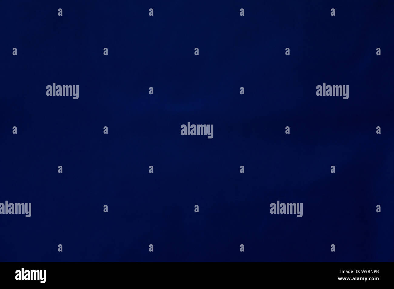 Factory fabric dark blue velvet texture background Stock Photo