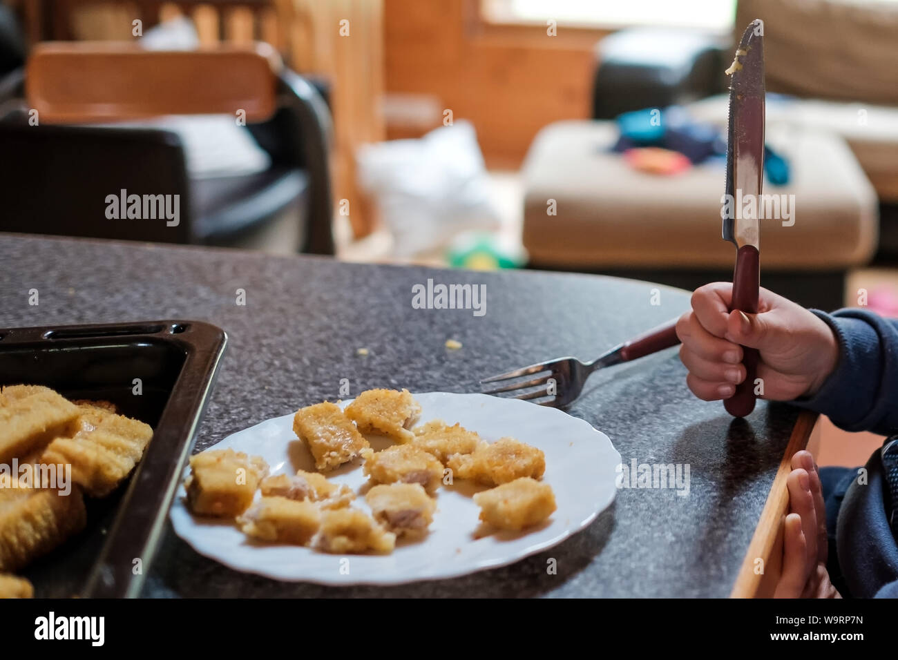 Crispy deep fried fish fingers for children diet Stock Photo Alamy