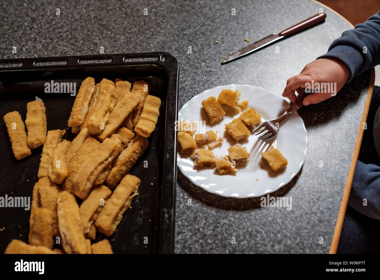 Crispy deep fried fish fingers for children diet Stock Photo Alamy