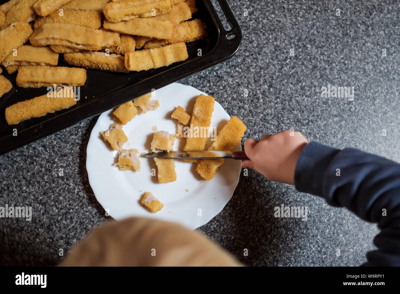 Crispy deep fried fish fingers for children diet Stock Photo Alamy