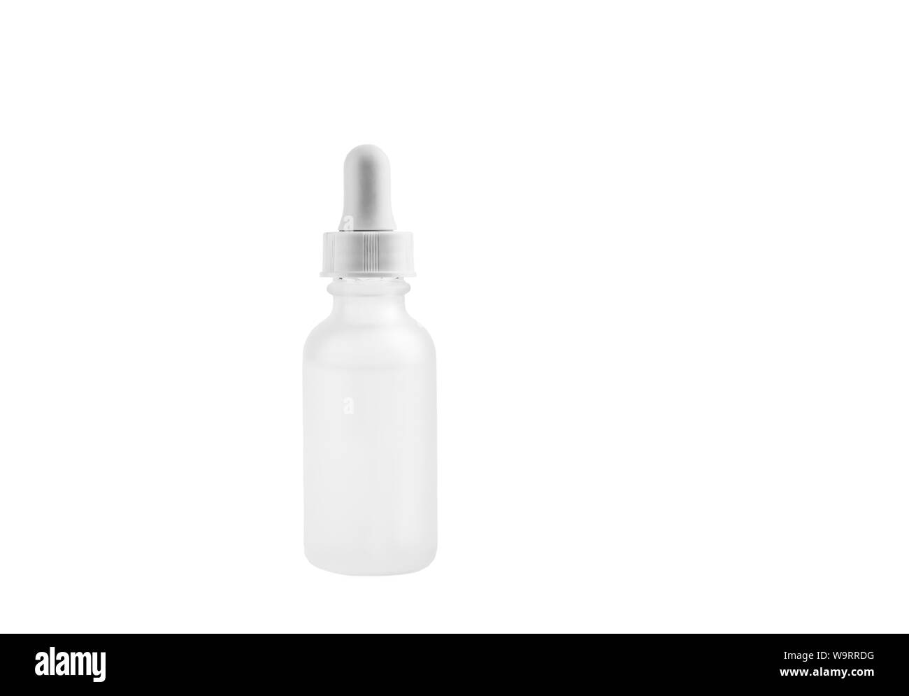 Small white matte medical cosmetic pipette dropper glass bottle isolated on white background. A lot of empty room and space for text. Stock Photo