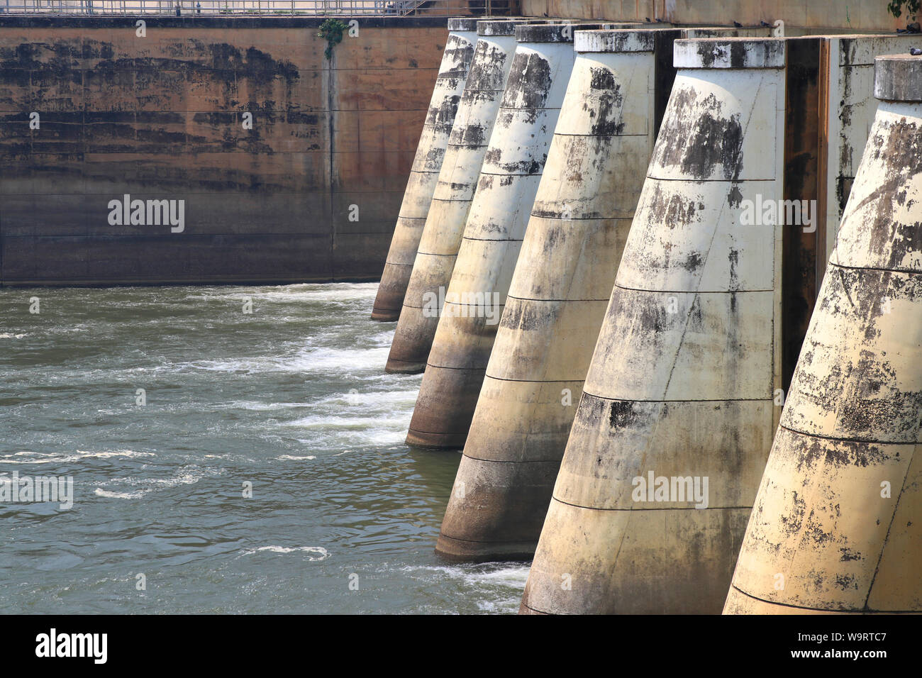 Dams are released for agriculture. Watergate and discharge. Dam for controlling water management. Stock Photo
