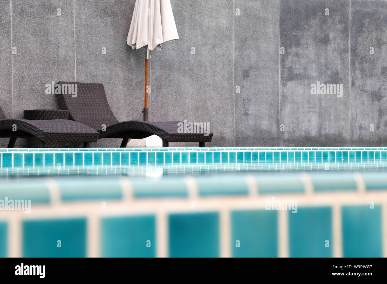Swimming Pool With Pool Chair Set And Umbrella The Pool Is