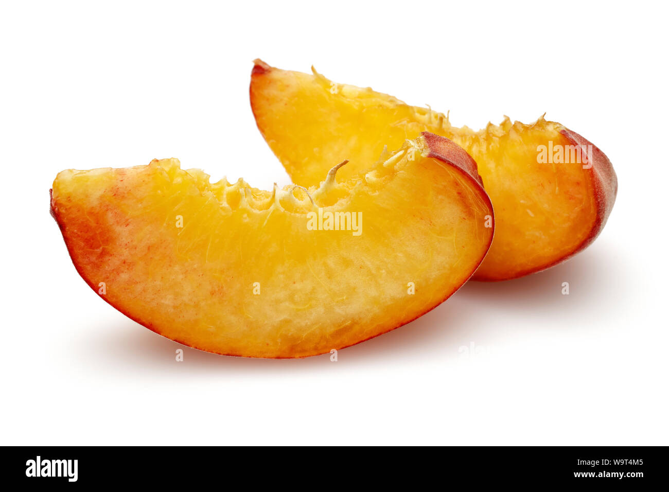 Fresh peach slices isolated on white background Stock Photo