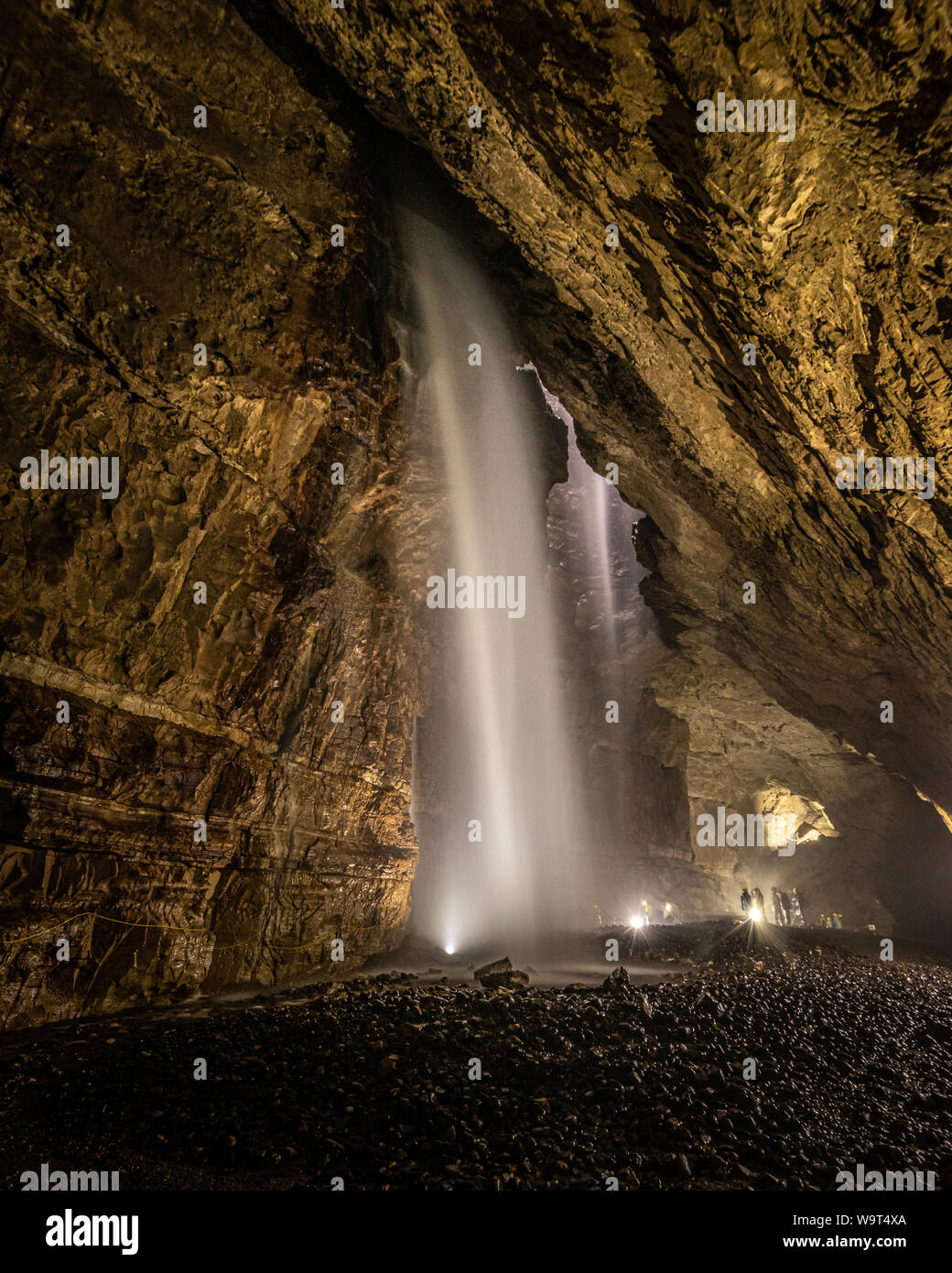 Inside Gaping Gill in Yorkshire one of the UK's largest underground chambers which is accessed through a pothole 98m (322ft) deep Stock Photo