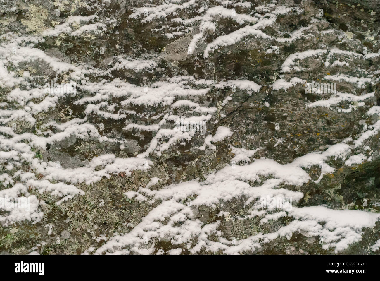 Background Texture Vertical Surface Of Natural Rock Covered With Snow Stock Photo Alamy Background Texture Vertical Surface Of Natural Rock Covered With Snow Stock Photo Alamy