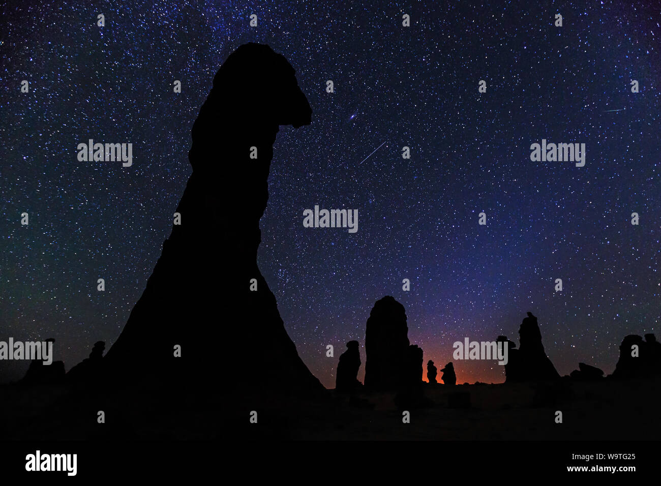 Rock formation silhouettes against the milky way, Riyadh, Saudi Arabia Stock Photo