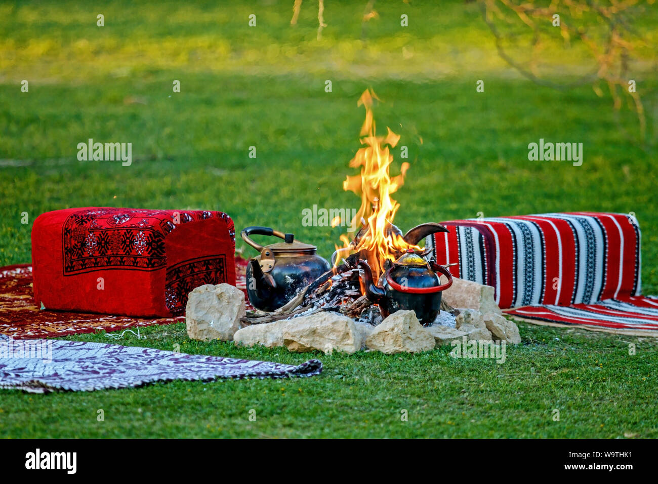 Close-up of kettles on a camp fire in the desert, Saudi Arabia Stock Photo