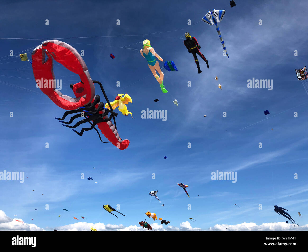 Kites flying in sky at a Kite Festival, Fanoe, Denmark Stock Photo Alamy
