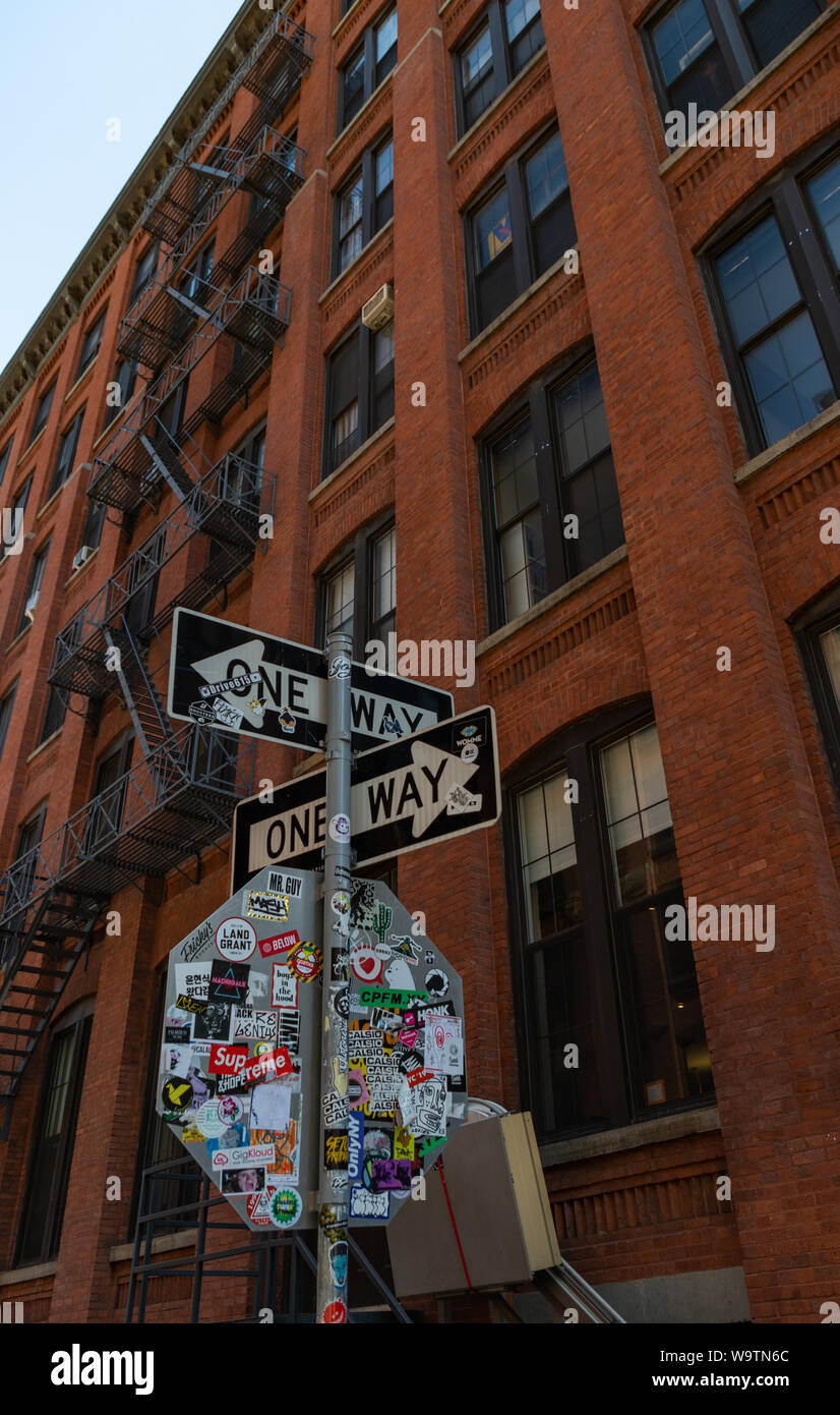 A picture of a street sign and building facade in the Dumbo area ...