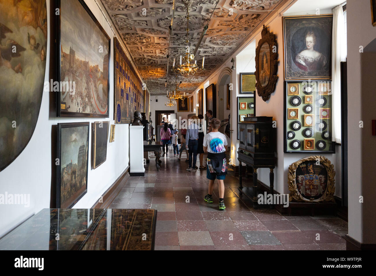 Rosenborg Castle interior - people in the Stone Corridor, ground floor, Rosenborg Slot Copenhagen Denmark Scandinavia Europe Stock Photo