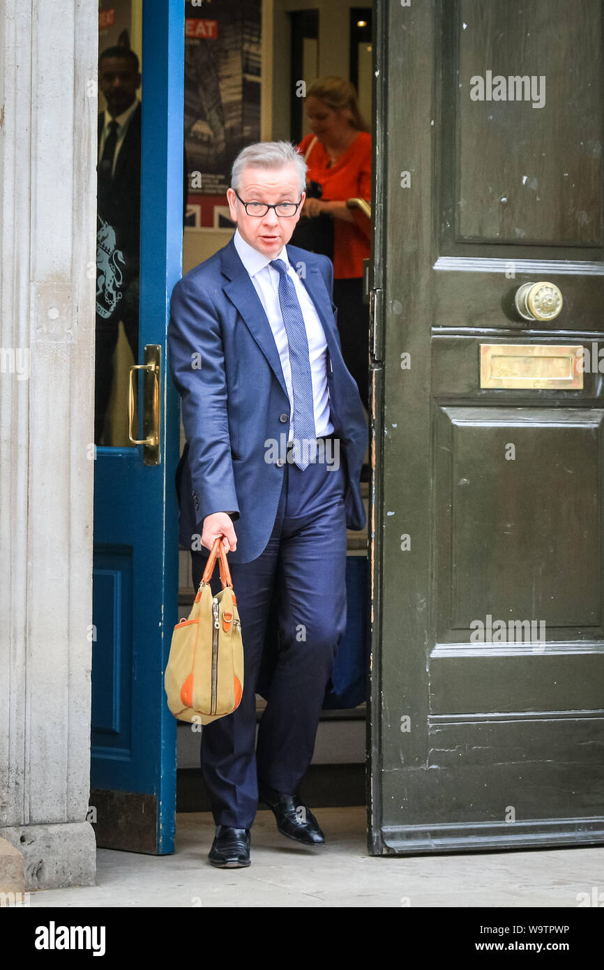 London, UK. 15th Aug, 2019.  Michael Gove, Chancellor of the Duchy of Lancaster with responsibility for no-deal Brexit preparations, as well as overseeing constitutional affairs, maintaining the integrity of the Union and having oversight over all Cabinet Office policy, exits the Cabinet Office in Whitehall. Credit: Imageplotter/Alamy Live News Stock Photo