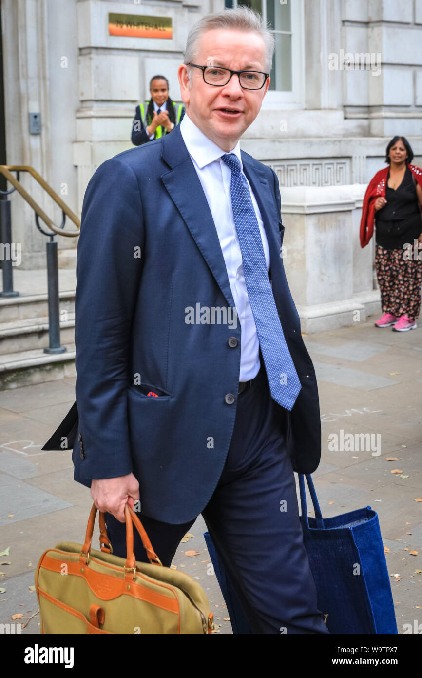 London, UK. 15th Aug, 2019.  Michael Gove, Chancellor of the Duchy of Lancaster with responsibility for no-deal Brexit preparations, as well as overseeing constitutional affairs, maintaining the integrity of the Union and having oversight over all Cabinet Office policy, exits the Cabinet Office in Whitehall. Credit: Imageplotter/Alamy Live News Stock Photo