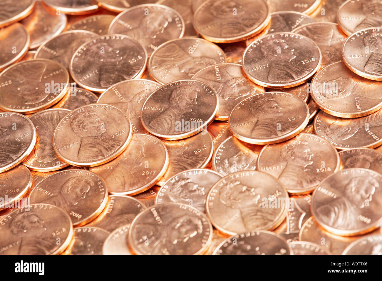 A Background of United States penny Coins Close up Stock Photo