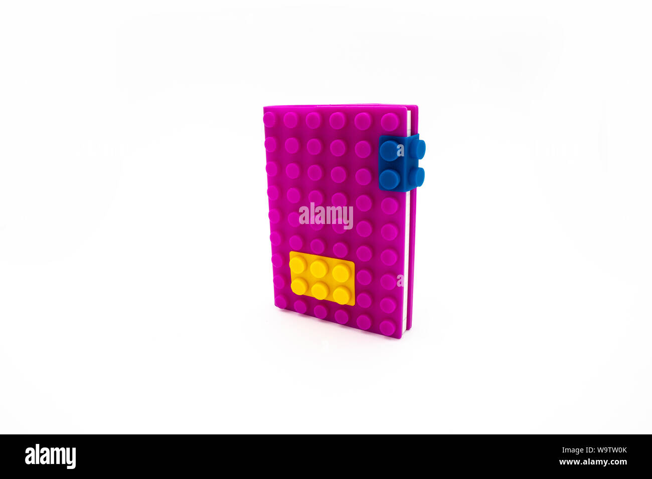 Creative purple color building blocks type notebook isolated on white ...