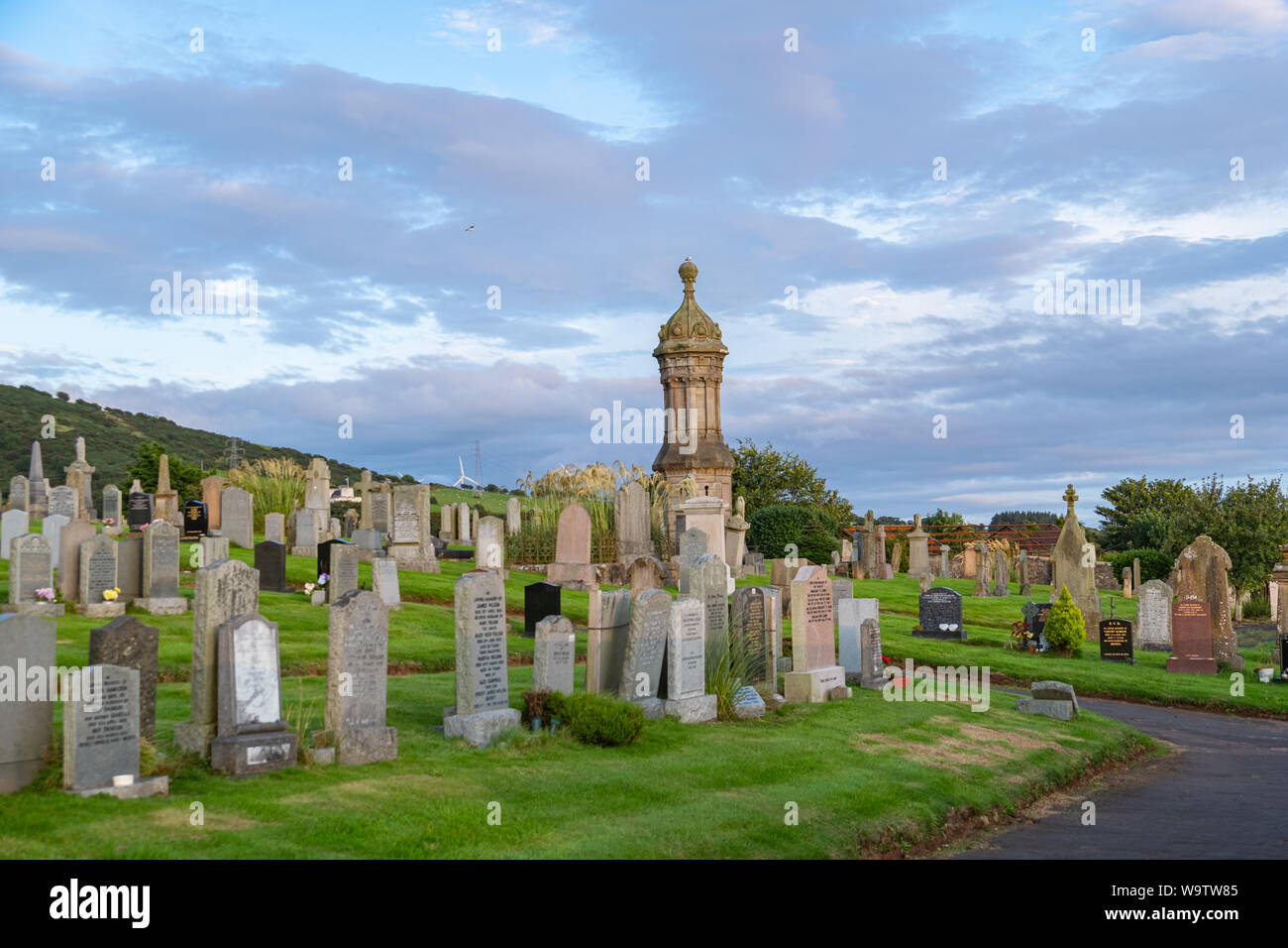 West Kilbride, Scotland, UK - August 10, 2019: Over looking the Gothic spier at West Kilbride cemetery on the west coast of Scotland. Stock Photo