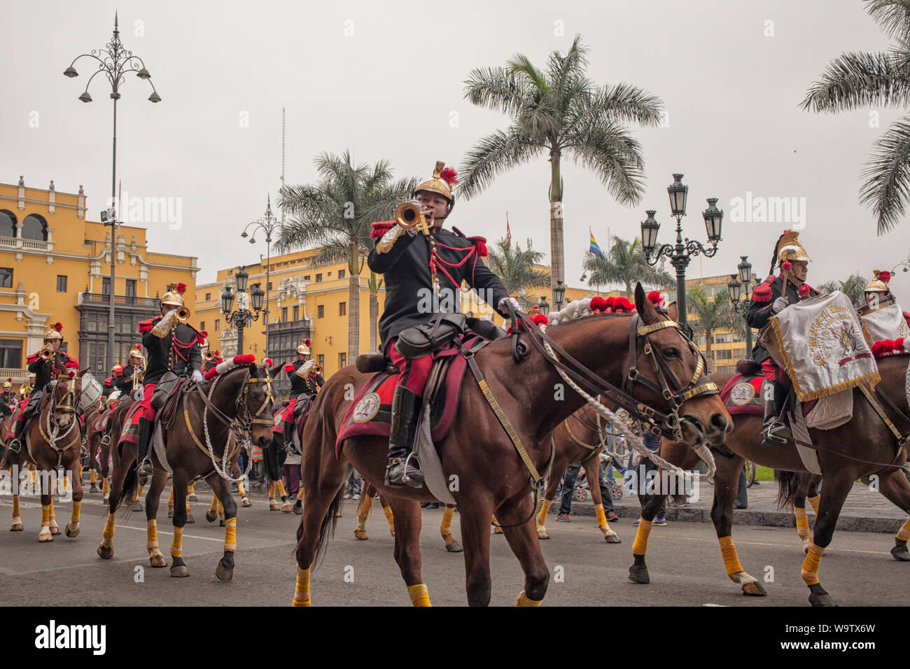 Mounted police buglers are part of the daily changing of the guard at the Palacio de Gobierno in the historic center of Lima, Pru Stock Photo