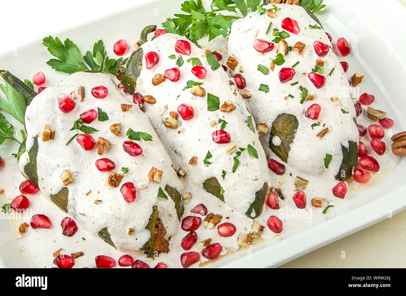 Chiles en nogada, a dish from Mexican cuisine Stock Photo