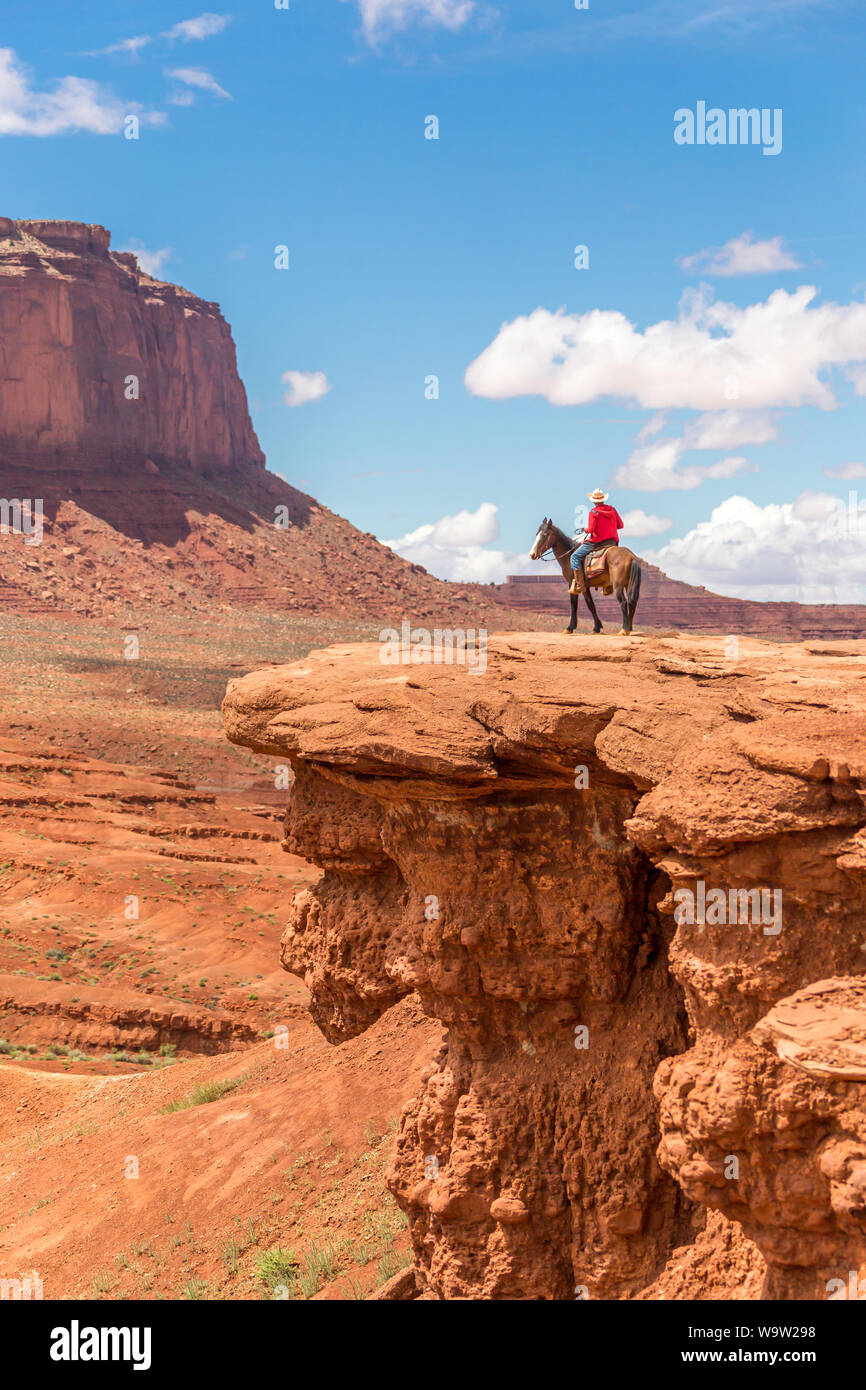 Cowboy looking at the horizon, Monument Valley Navajo Tribal Park Stock Photo